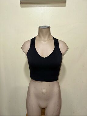 Woman’s Pink Victoria’s Secret athletic sports bra seamless lightly lined